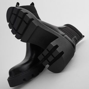 Heeled track sole ankle boots